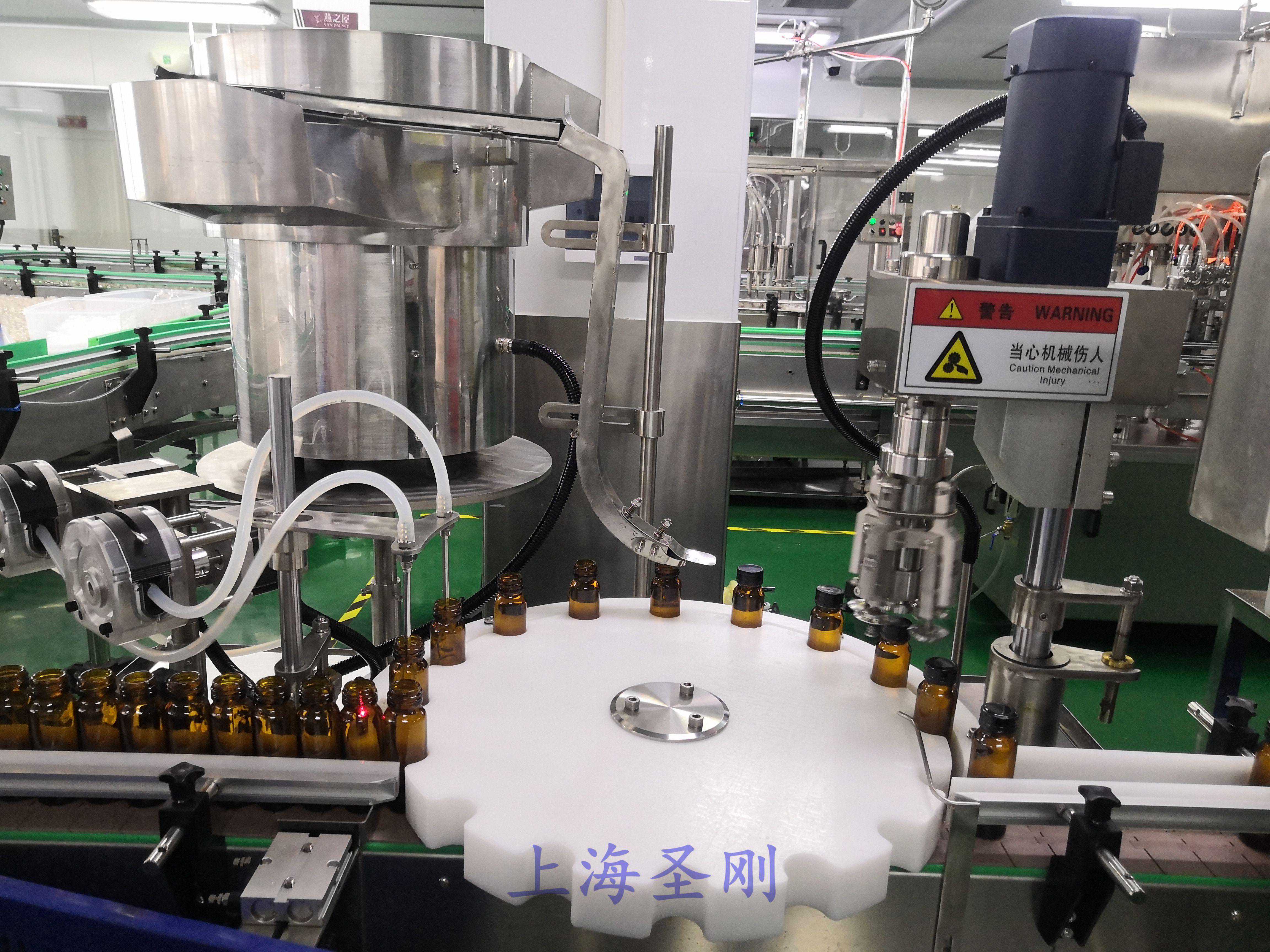 口服液灌装轧盖机工作原理 拨云见日求真相